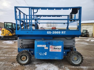 2013 Genie GS 2669 RT Scissor Lift - Image 2